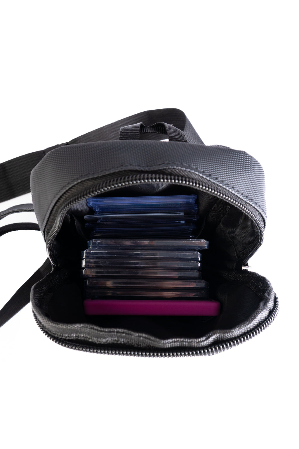 Black backpack with compartments on a white background