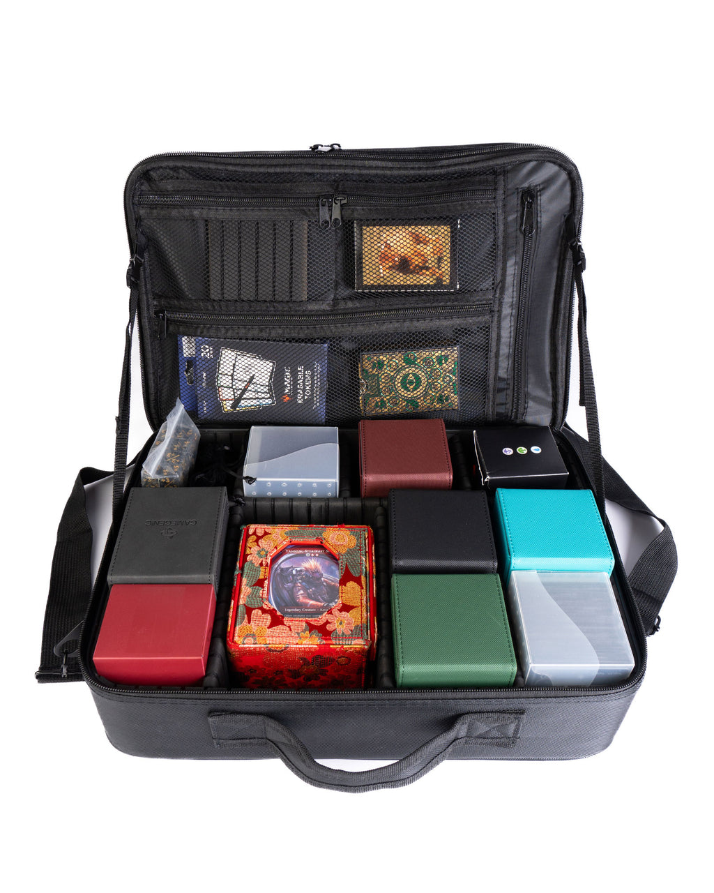Black carrying case with compartments holding various small boxes and items on a white background